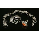 A sterling silver matched bracelet, brooch and ring suite,attributed to Charles and Gladys Mumford