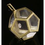 A French gold, single stone, diamond and Perspex pendant, c.1970,with a brilliant cut diamond