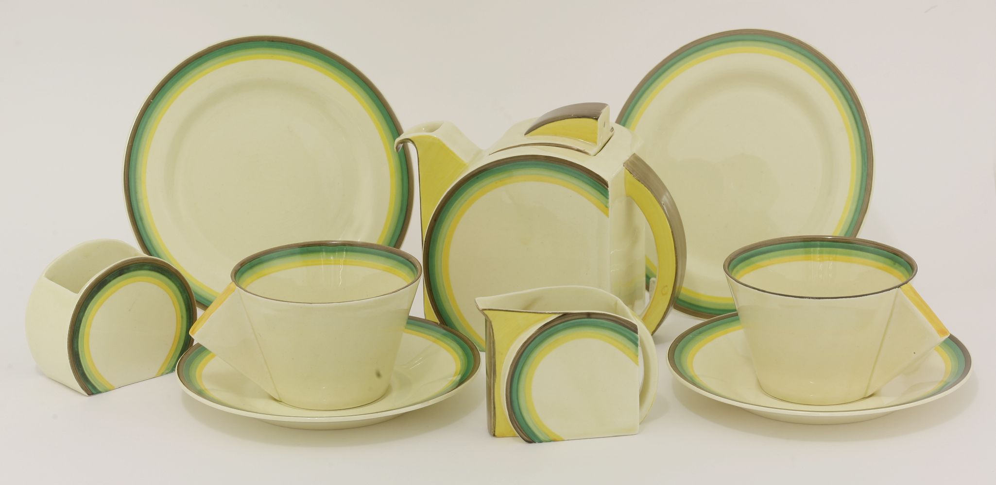 A Clarice Cliff 'Stamford' shape tea set for two,each item with coloured bands, comprising:a