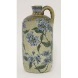 A Martin Brothers' stoneware bottle ewer,with gentian flowers on a buff ground, incised 'Martin