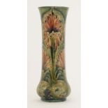 A William Moorcroft Macintyre 'Revived Cornflower' pattern vase,the swollen base with a tall