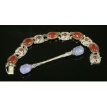 A sterling silver Arts & Crafts-style cornelian bracelet,by Sydney & Co., Birmingham 1977, in the