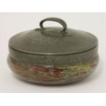 A 'Tudric' pewter powder pot and cover,mounted with a mottled glass base, stamped 'Tudric 5013',