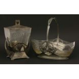 A silver-plated biscuit barrel and cover,the glass wedge-shaped body with cut details, unmarked,21cm