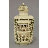 An ivory Snuff Bottle,late 19th century, pierced and carved with figures playing qi or cricket-