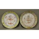 A pair of famille rose Canton enamel circular Saucer Dishes,early Qianlong period, each painted with