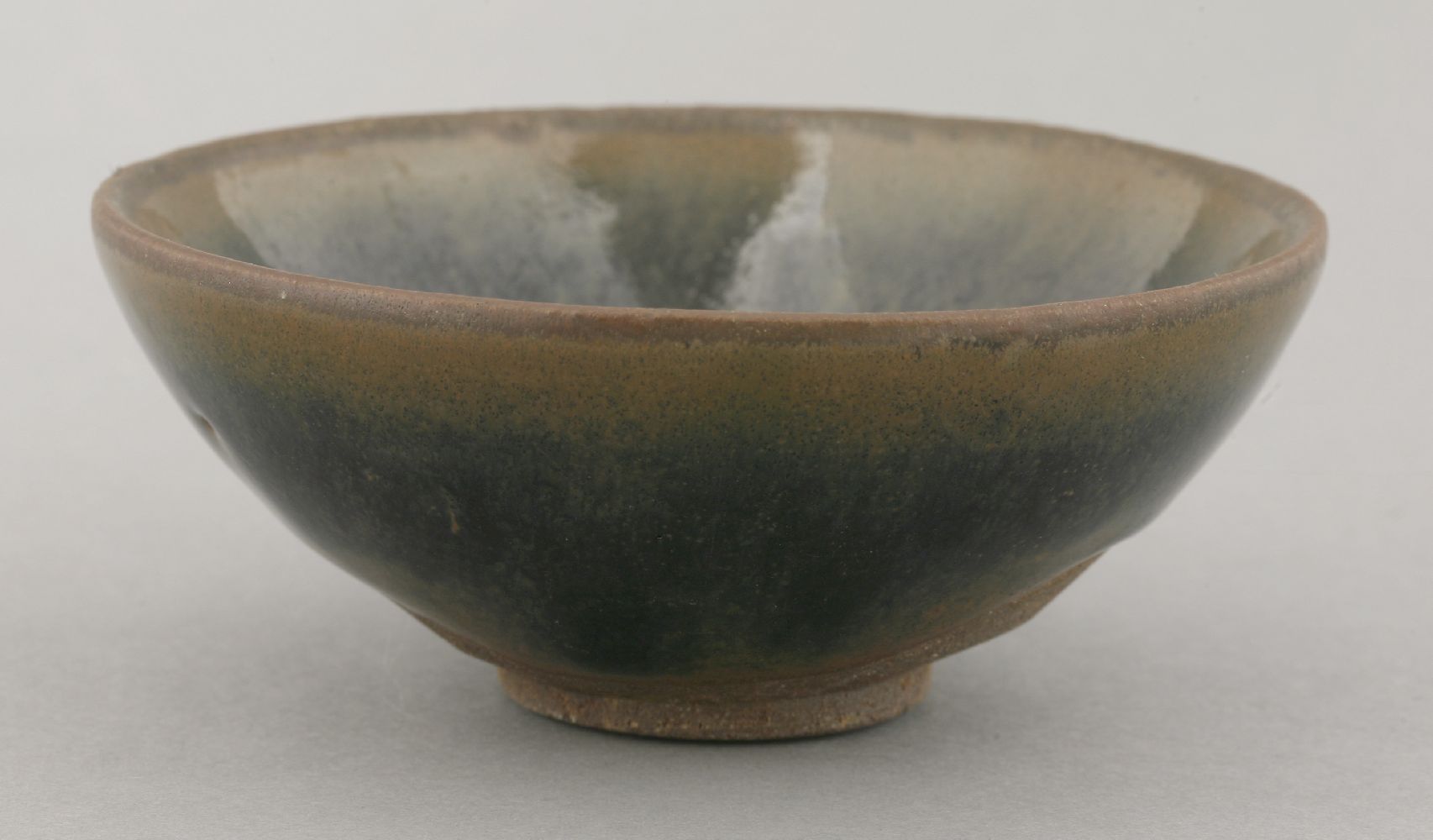 A Jianyao small circular conical black-glazed Tea Bowl,Song dynasty, 12th century, merging to