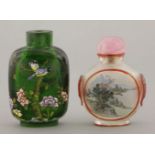 Two glass bottles, 20th century, one green and enamelled with birds in bamboo and peony, 6.5cm,