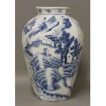 A blue and white vase, 20th century, in the Ming style, of octagonal form painted with figures
