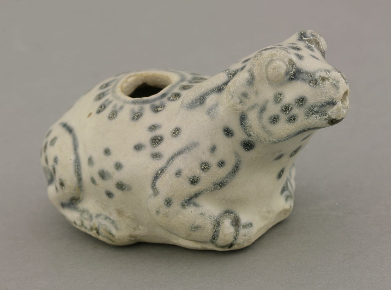 An attractive Annamese Water Dropper,15th century, the warty toad with bulging eyes, his mouth and