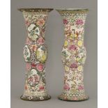 A pair of famille rose Canton enamel Beaker Vases,18th century, with flared mouths and central bulge