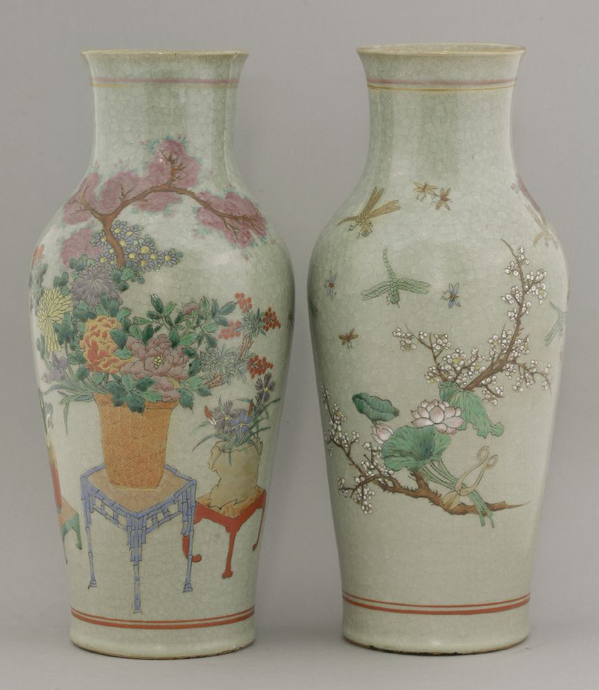 A pair of famille rose Vases, late 19th century, enamelled with vases issuing peony,
