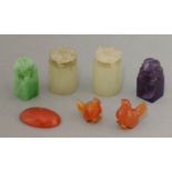 Hard stones, a pair of pale-grey jade seals, 2.9cm; two others of square section of jadeite and