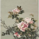 A pair of embroidered pictures, early 20th century, each in silk thread with a cart carrying prunus,