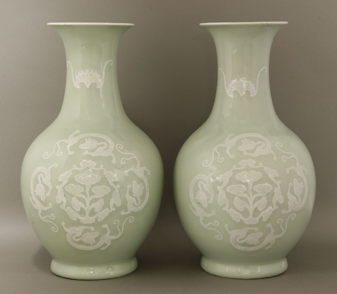 A pair of pale celadon Vases,c.1900, each globular body enamelled with ruyi encircled by four