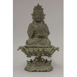 A bronze Bodhisattva, Yuan dynasty (1279-1368), seated with one hand in Dharmachakra mudra, the