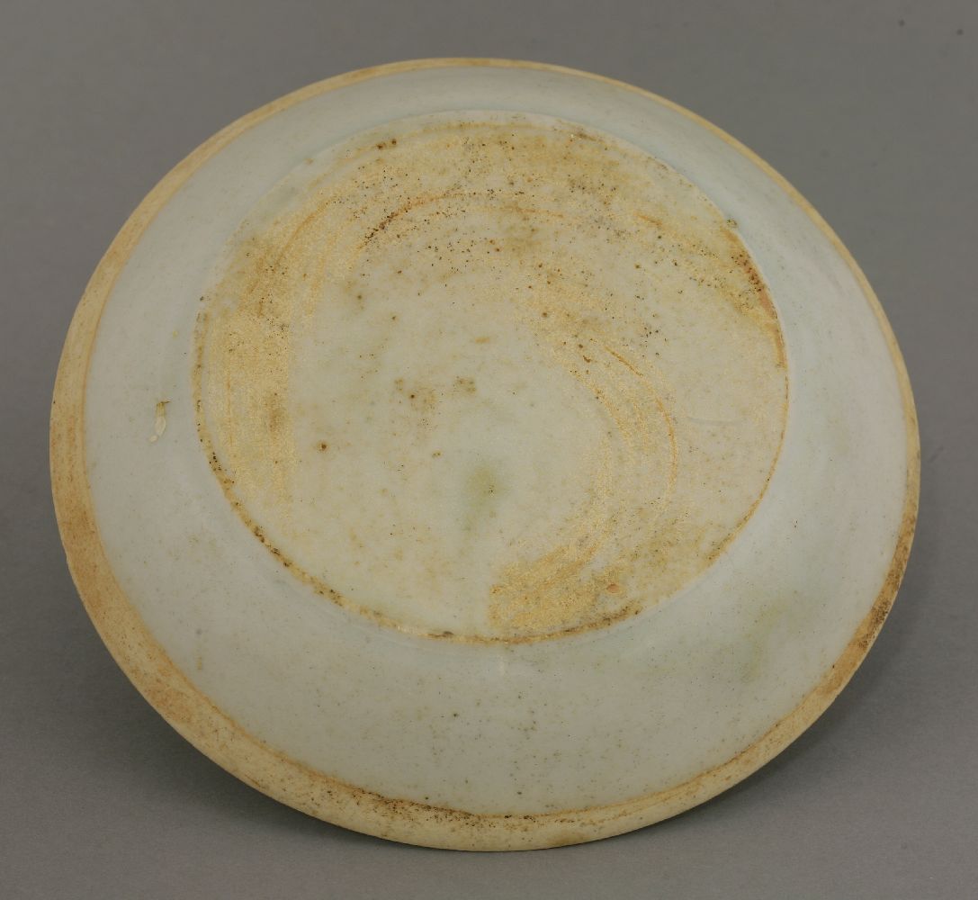 A qingbai Dish,Southern Song (1127-1279), moulded in the centre with two carp and two mandarin ducks - Image 2 of 2