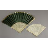 An unusual ivory Fan,mid 19th century, well carved in Chinese style with panels of pagodas, trees,