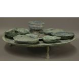 A bronze Supper Set,Han dynasty (206BC-AD220), comprising a large tray, six ear cups in two sizes, a