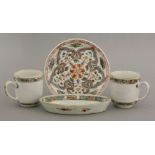 Famille Verte, Kangxi (1662-1722), comprising:two coffee cups, each pencilled in pale blue on the