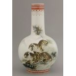 A famille rose vase, 20th century, painted with two tigers besides a cliff, inscription to the rear,