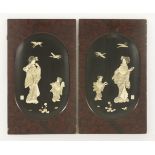 A pair of black-lacquered Panels, c.1880, onlaid with carved bone, mother-of-pearl and ivory bijin