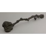 A bronze ruyi sceptre, 20th century, naturalistically cast as a lingzhi, 34cm