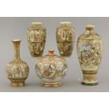 Five vases, late 19th century, three 'Satsuma', variously enamelled and gilt with figures in panels,