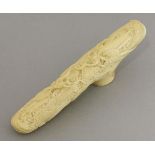 A Canton carved ivory Walking Cane Handle,c.1870, finely carved with two opposing dragons amongst