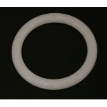 A white jade bangle, late Qing dynasty, of rounded form, and pale, even tone, 5.8cm inner diameter