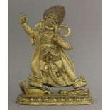 A gilt bronze figure of Vajrapani, 20th century, with flaming hair standing on a horse and a