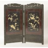 A blackwood single fold Screen, c.1880, each panel carved in bone with birds amongst blossoming