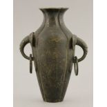 A bronze Vase,first half of the 19th century, quatrelobed and engraved with dragons, the neck with
