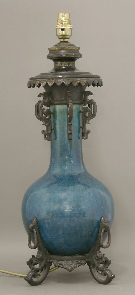A monochrome blue Vase,19th century, the globular body and cylindrical neck under a finely crazed,