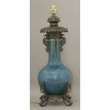 A monochrome blue Vase,19th century, the globular body and cylindrical neck under a finely crazed,