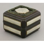 A wooden box and cover, 20th century, of square section, the top inset with pierced and carved white