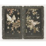 A pair of black-lacquered Panels, c.1880, each onlaid with high relief carved bone, abalone shell