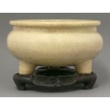 A ge-type glazed tripod Censer,Ming dynasty, mid 17th century, the depressed globular body with