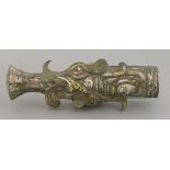 A cast copper alloy Sword Hilt, in the form of mythical beast, gilded with gold and silver,