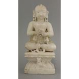 An Indian carved alabaster of a Female Deity,19th century, seated in meditation on a rectangular