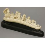 A good Indian ivory Group,of the Lord Vishnu reclining on cushions while his feet are massaged by