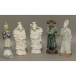 A pair of white-glazed wall pockets, c.1900, each of a maiden immortal with a basket of flowers, a