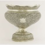 An Indian silver bowl,possibly Kashmir, c.1930,of circular form with flared rim on pedestal circular