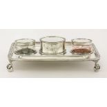 An Edwardian silver inkstand,by John Grinsell & Sons, London 1902,of rectangular form with reeded