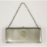A Continental silver lady's evening purse,Finnish 1919,of plain oblong form with applied gold