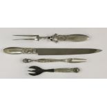 A pair of Georg Jensen silver ‘Cactus’ pattern carvers,import hallmarked 1936,the knife 34.25cm