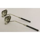 Two silver-plated straining ladles,in the Christopher Dresser style,with ebony angular handles,33/