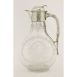 A Victorian silver-mounted glass claret jug,by W & G Sissons, Sheffield 1878,the body etched with