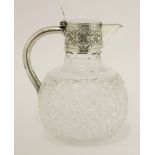 A Victorian silver-mounted cut glass claret jug,maker's mark G C W, Birmingham 1895?,of bulbous