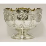 A metalwares punch bowl,stamped Lale?, 925 sterling,decorated with foliage and frieze of plain
